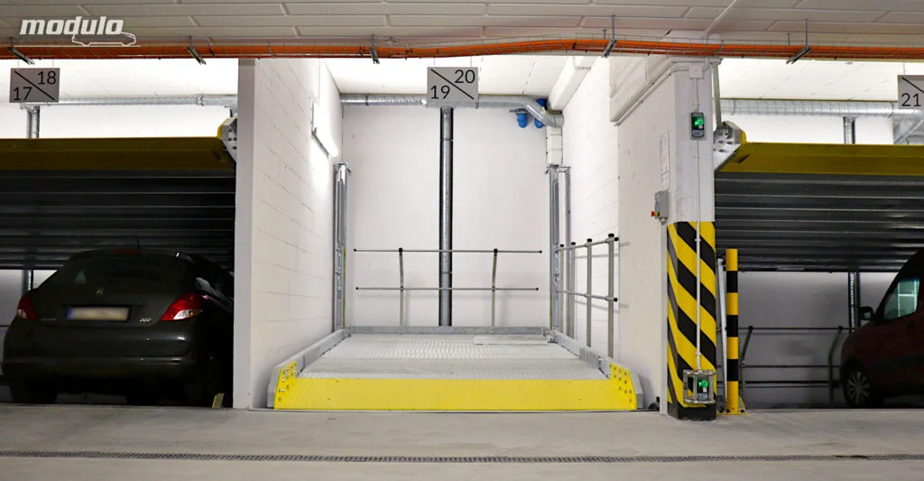 Platformy parkingowe MODULO Parker-S100 i MODULO Stacker-P10 w garażu podziemnym – 30 miejsc parkingowych.